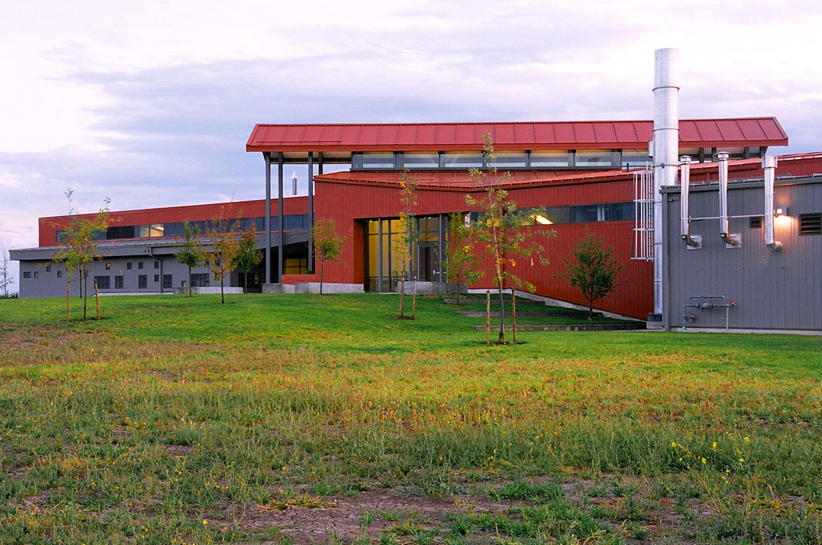 A red barn looking facility that is the Agricultural Teaching and Research Facility.